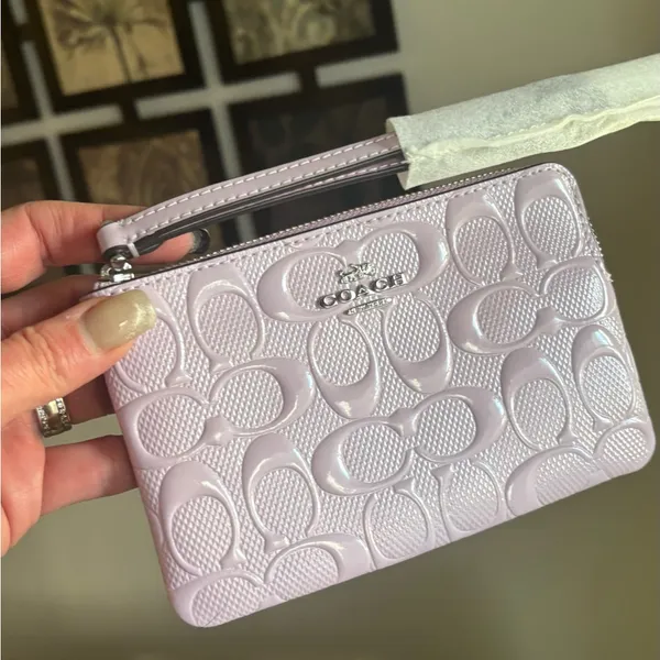 Authentic COACH patent signature leather zip top wristlet with a heart charm - Image 10