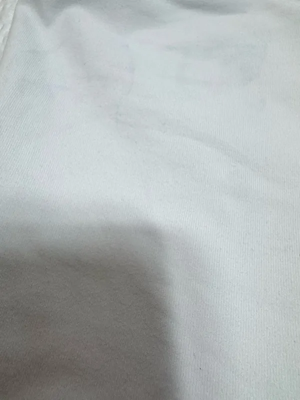 Alo High-Waist White Bike Shorts with Overlay - Image 2