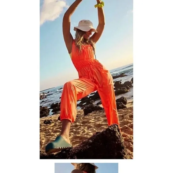 Free People Movement tropic sport one piece orange jumpsuit. Size medium - Image 3