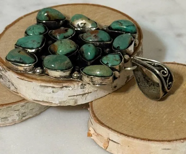 Turquoise cluster pendant set in Tibetan Silver. 14 nuggets, 2”x2” - Image 5