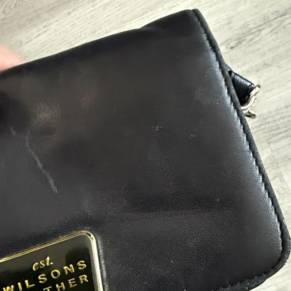 Wilsons Leather Black Mini Bag with Gold Plaque - Image 2