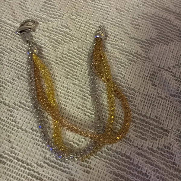 Elegant Gold and Silver Braided Bracelet - Image 2