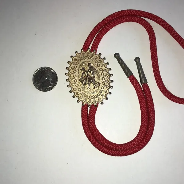 Red Western Bolo Tie with Decorative Gold Tone Dancer Medallion - Image 4