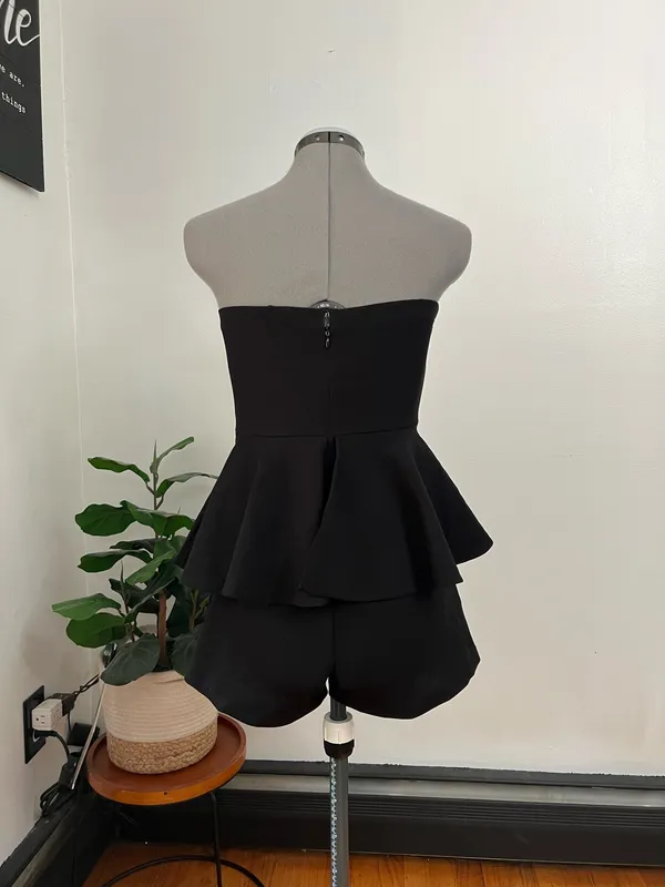 Strapless Black Peplum Romper with Gold Chain Detail - Image 4