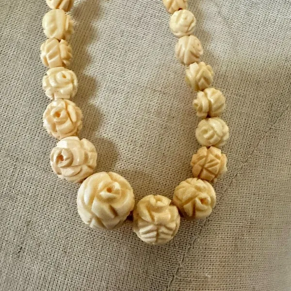 Vintage Hand-Carved Bone Bead Necklace with Floral Detail - Image 4