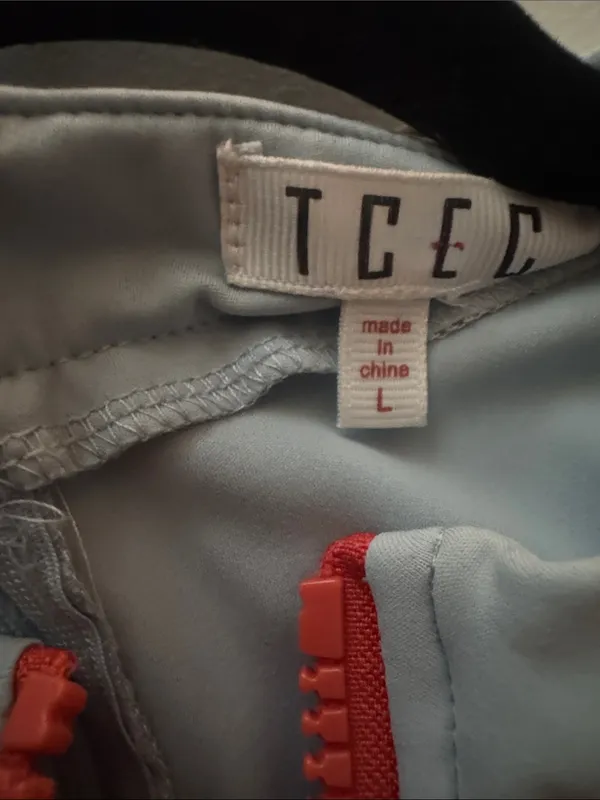 TCEC Light Blue Athletic Dress/Shorts with Coral Zip Detail - Image 6