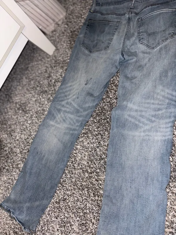 American Eagle Outfitters Slim Straight Light Blue Jeans with Paint Details - Image 9