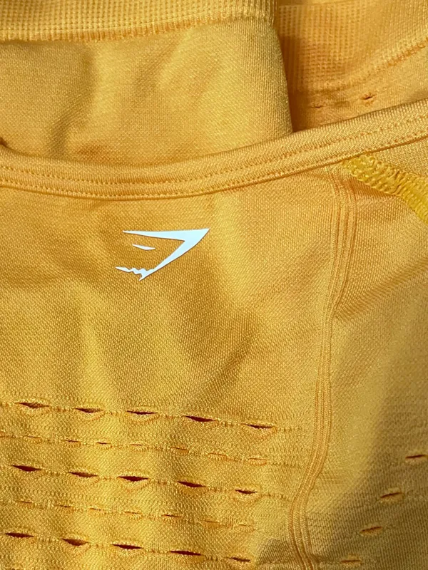 Gymshark Vibrant Yellow Gold Flawless Knit Long Sleeve Eyelet Athletic Crop‎ Top - Image 4