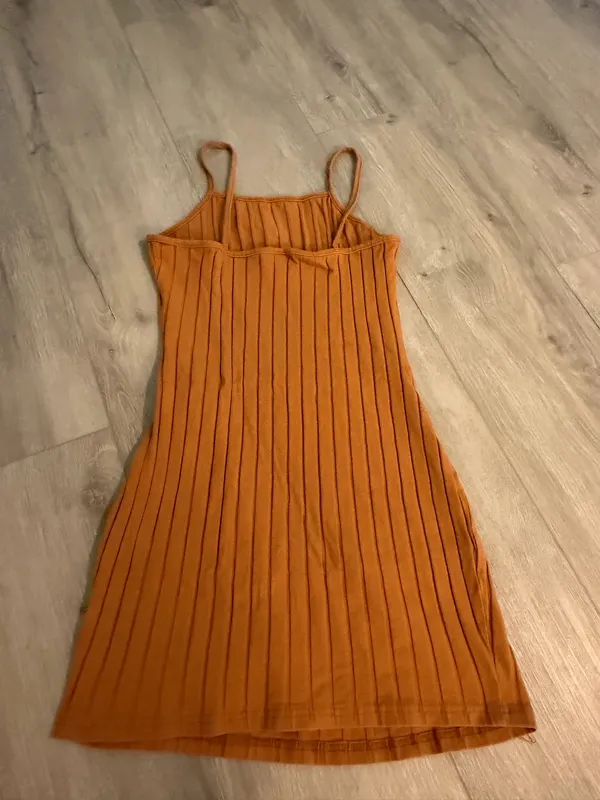 SHEIN Ribbed Cami Mini Dress – Size Small – Like New This camel brown ribbed cami mini dress from SHEIN is in excellent, like-new condition with no visible marks, stains, or flaws. Brand: SHEIN Size: Women's Small (US 4 / EU 36) Condition: Like New / Flawless Features: Vertical ribbed knit texture, cami spaghetti straps, stretch fit, casual mini length Comfortable and versatile, it pairs perfectly with sandals, sneakers, or layered under a jacket or cardigan. Ships fast from a clean, smoke-free home! - Image 2