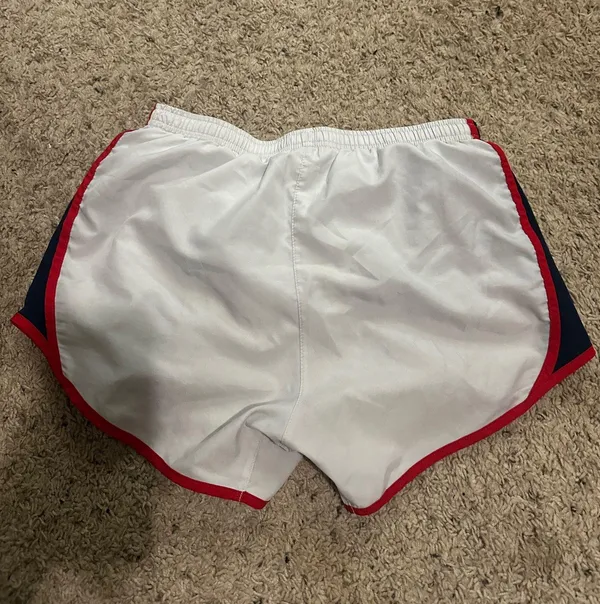 White Nike Dri-Fit Running Shorts with navy and red detail - Image 2