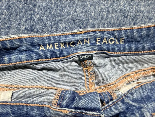 American Eagle Light Wash Distressed Denim Shorts with Frayed Hem - Image 2