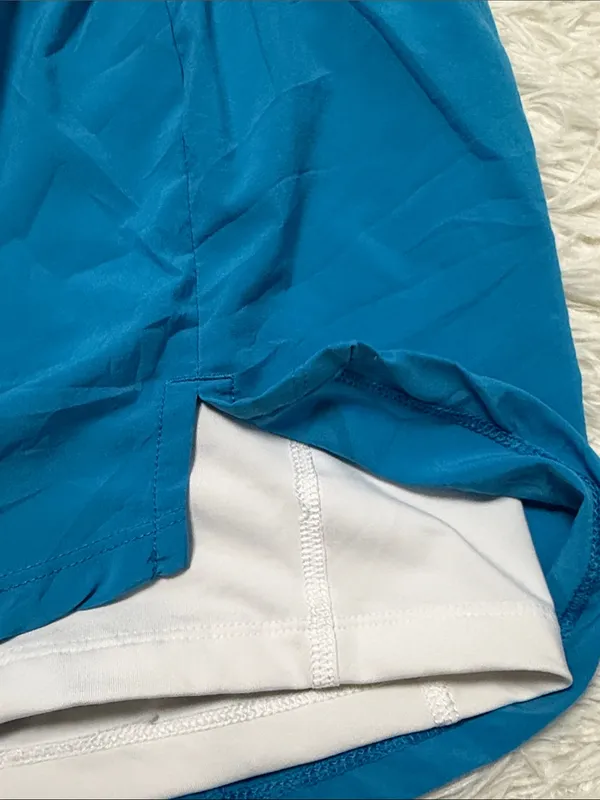 Nike Women's Teal Athletic Running Shorts with White Inner Brief - Image 4