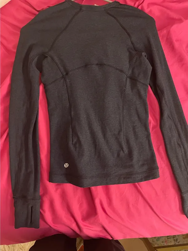 Lululemon long-sleeve training/workout top with a zip pocket - Image 2