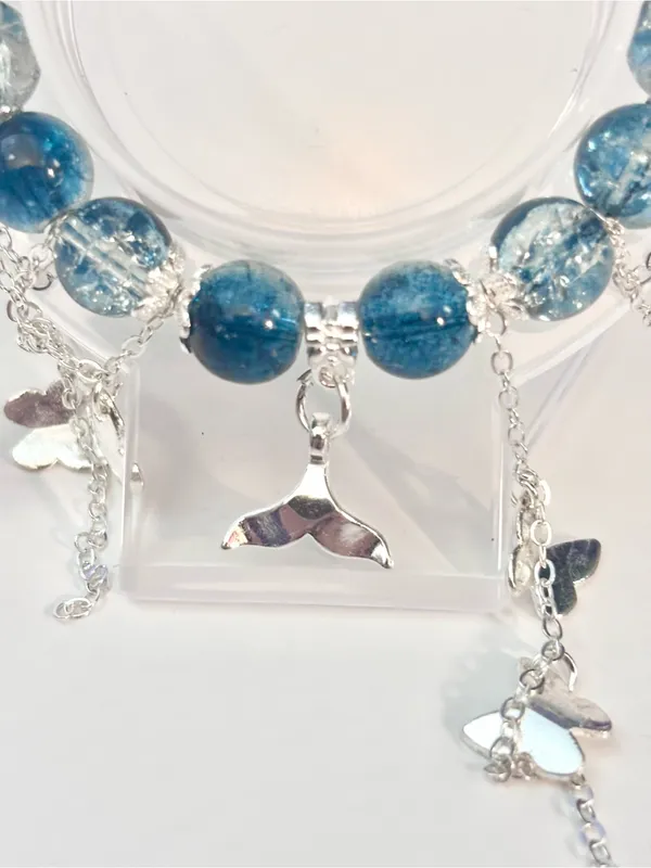 Hand Crafted Blue Beaded Charm Bracelet with Whale Tail And Butterfly Accents - Image 2