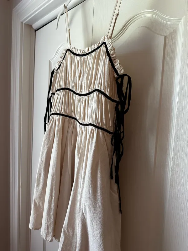 idem Ditto Cream Mini Sundress with Black Trim and Side Ties - Image 5