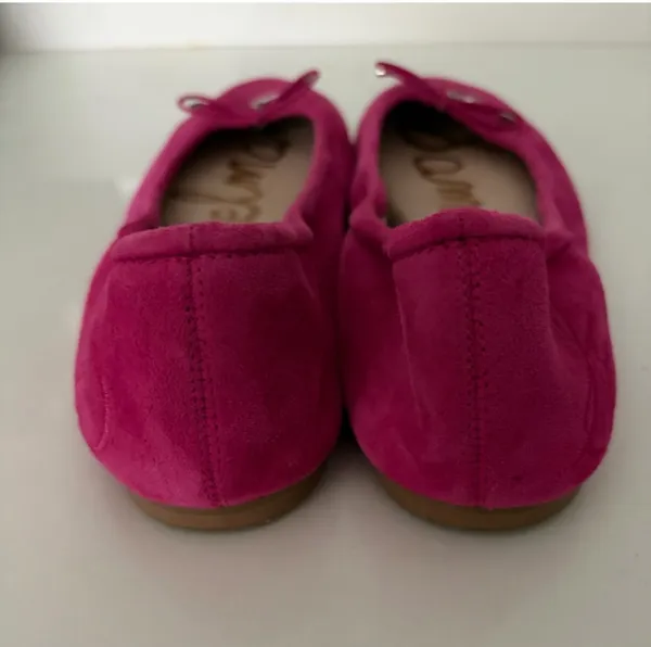 Vibrant pink suede, leather ballet flats by Sam Edelman. Featuring a rounded toe with silver logo charm detail. Perfect for adding flair to any outfit. - Image 4