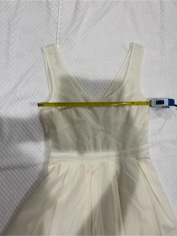 Cream Sleeveless Mini Dress with Eyelet Bodice - Image 3