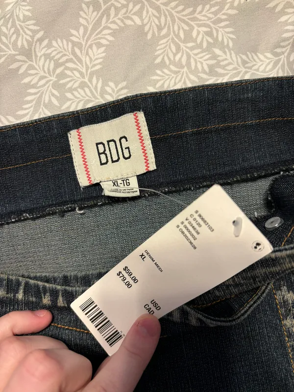 Urban Outfitters mini asymmetrical denim skirt with button closure - Image 5