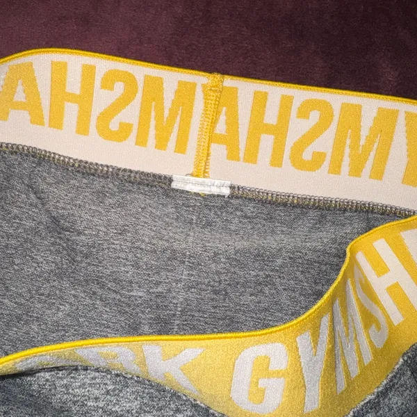 Gymshark Heather Gray Shorts with Yellow Waistband - Image 3