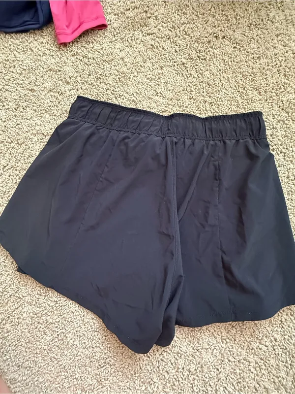 Nike Women's Black Layered Athletic Shorts with White Swoosh - Image 4