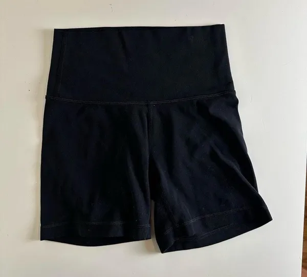 Aritzia Tna Butter Set this set comes with cheeky biker shorts, hold tight bra, and butter bound t-shirt all in black set retails for $136 - Image 6