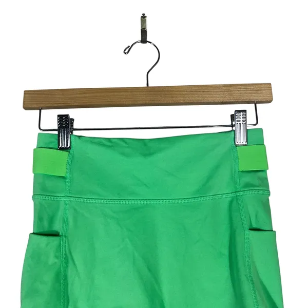 Fabletics High-Waisted Solid Biker Shorts Green Neon Athletic Pockets Size XS - Image 2