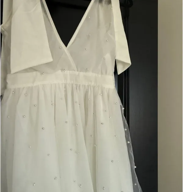 Showpo NWT Karalyn mini dress- bow strap plunge pearl detail size 6 - Image 4