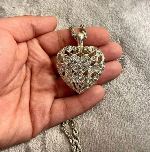 Silver colored heart locket necklace filled with rhinestones in the front side - Image 4