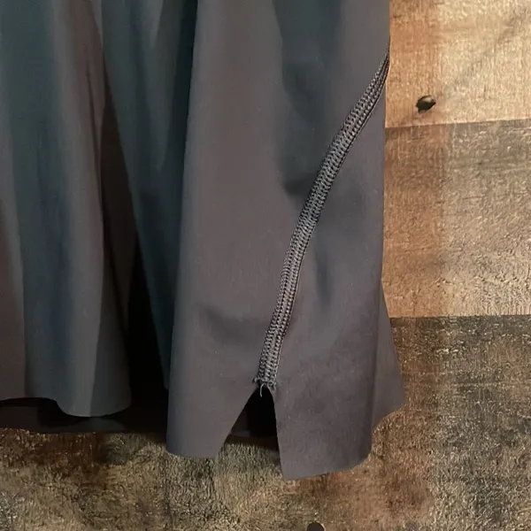 Athleta Ace Black Tennis Skort with silver reflective stripe on waistband - Image 4