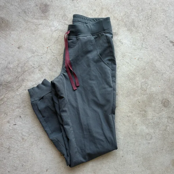FIGS Zamora Jogger Scrub Pants in the limited-edition bonsai green colorway, featuring a comfortable yoga waistband and contrasting reddish drawstring - Image 7