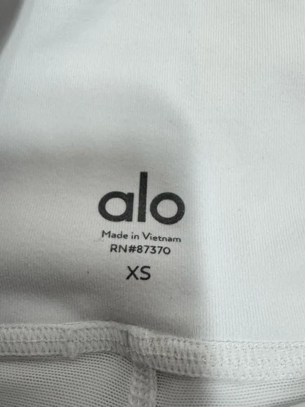 Alo High-Waist White Bike Shorts with Overlay - Image 5