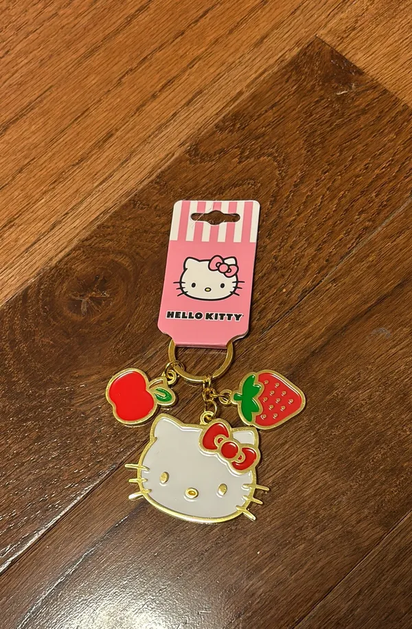 Hello Kitty NWT Sanrio  Fruit Keychain gold tone - Image 2