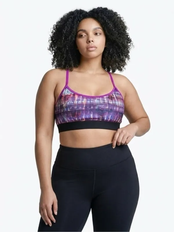 Alo Yoga racerback Spark sports bra featuring a purple abstract print - Image 4