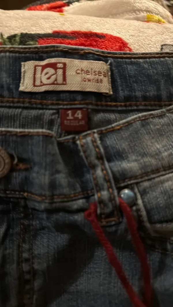 Stylish blue denim shorts with a trendy distressed look. Perfect for casual outings. - Image 3