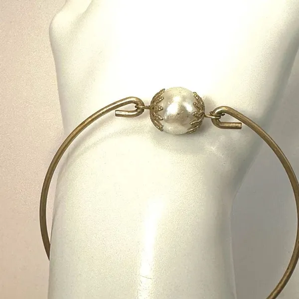 Gold tone faux pearl bangle bracelet - Image 4