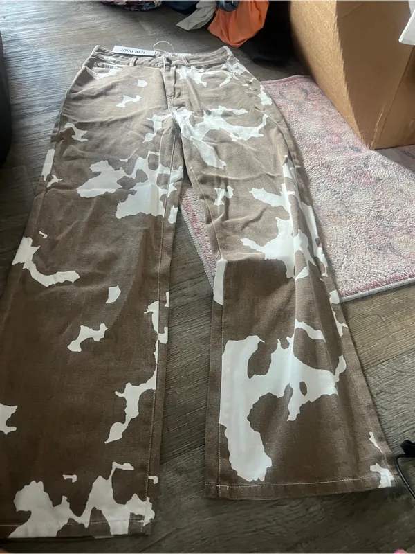 NWT 12th Tribe cow print jeans size small - Image 13