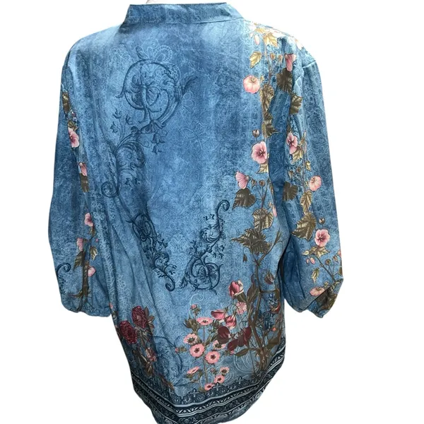 Blue faded look top with floral design. - Image 4