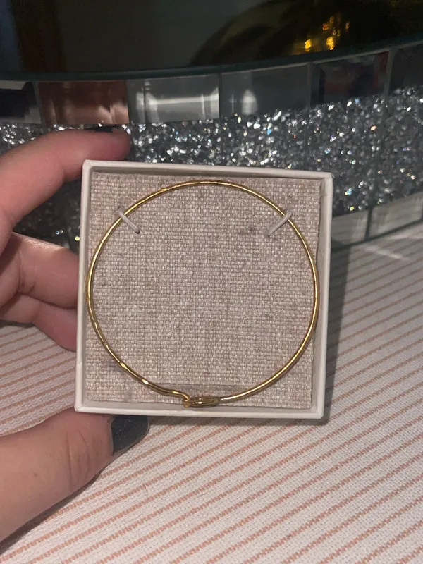 This is a Pura Vida bracelet featuring a dainty gold-tone wave charm - Image 5