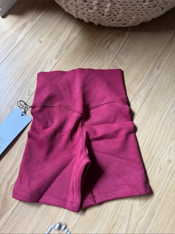 ALO Yoga Ribbed High-Waist Bike Shorts in Romance Red - Image 4
