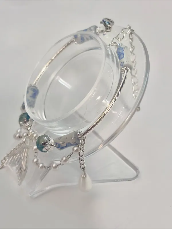 Handmade Hand Crafted Silver Bracelet with Blue and White Beads and Mermaid Tail Charm - Image 4