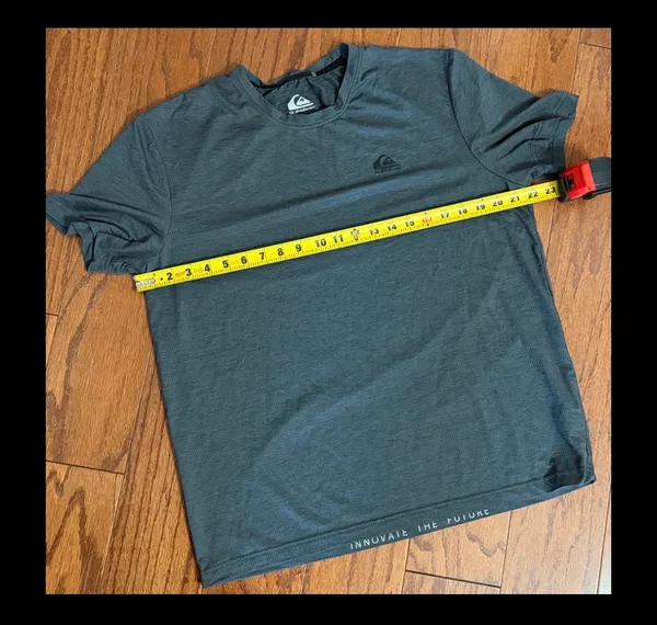 QuikSilver Gray /Charcoal T-shirt - size Large. Gently Warn & in excellent condition. Innovate your future printed on back tail. True color is the ones with measurements. Measurements approximately 22” from armpit to armpit x 26” long. Non-smoking home. priced to sell at as is condition. Don’t like my price, make reasonable offer! And thank you for checking my closet. - Image 8
