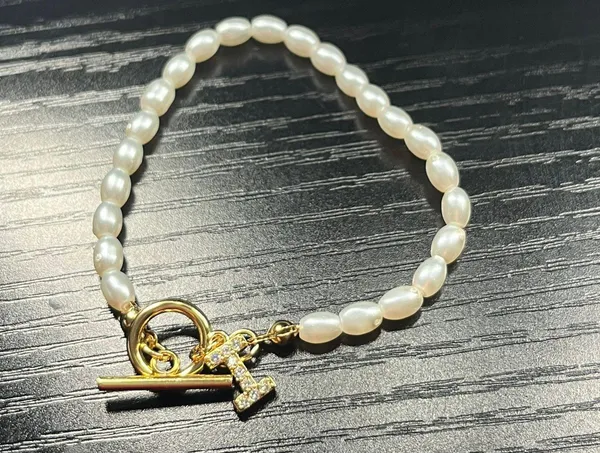 Initial “I” Gold And Pearl Bracelet - Image 2