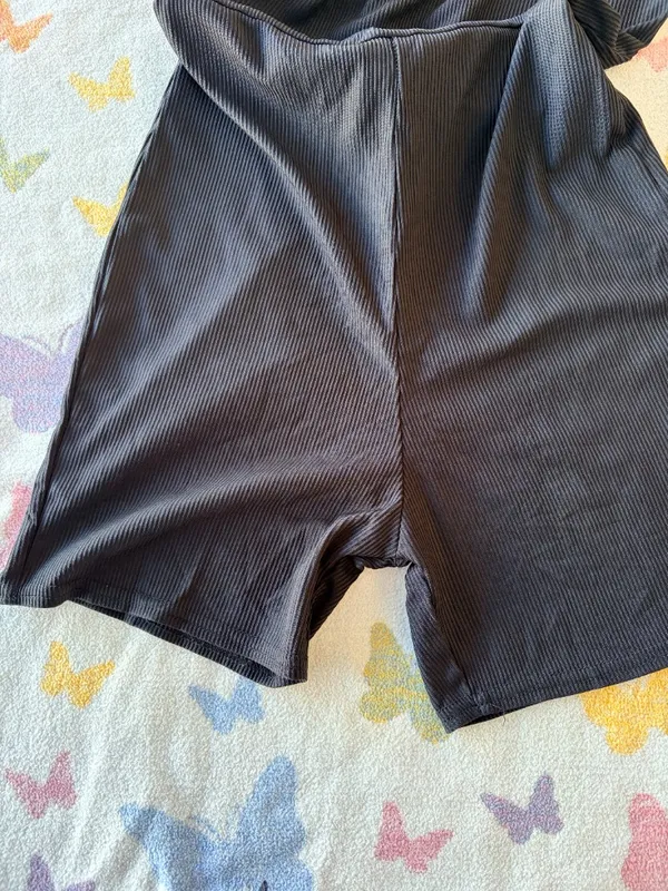 Pretty Little Thing | Black Ribbed Mock Neck Mini Romper | Size 8 - Image 4