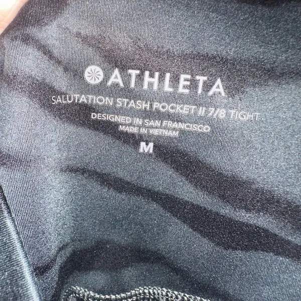 Athleta M salutations stash pocket II zebra stripe tight 7/8 leggings - Image 4
