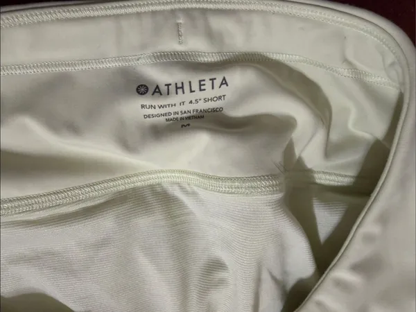 Athleta run with it shorts pastel lime green - Image 3