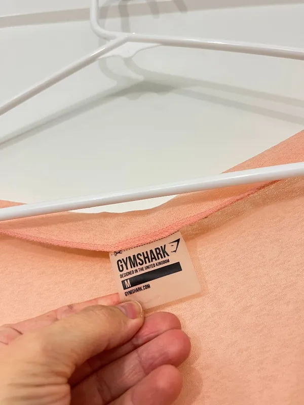 Gymshark x Nikki Blackketter Medium Peach Asymmetrical Hem Athleisure Top - Image 3