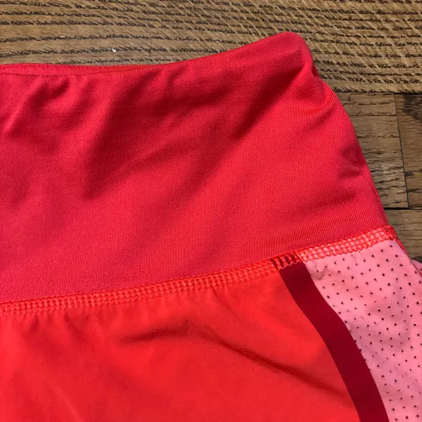 Athleta Acceleration Running Shorts Orange - Image 3