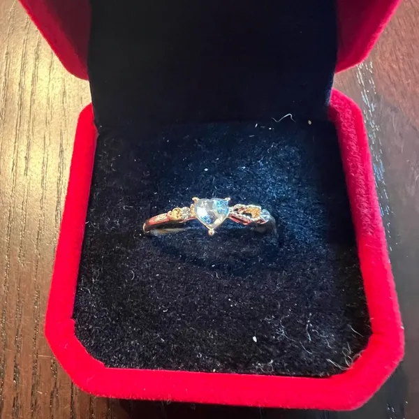 Dainty White Gold Diamond Ring with Accent Stones - Image 2