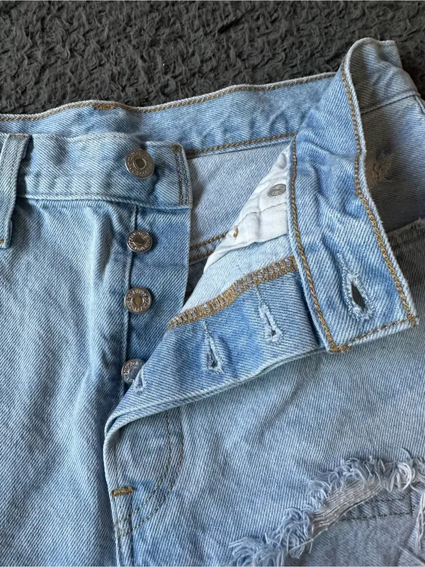 Levi’s 501 denim light wash shorts with distressing, size 29 - Image 2