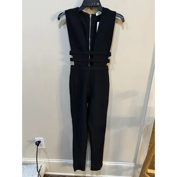 Tiger Mist black jumpsuit featuring a deep plunging neckline Size Small Cutouts - Image 2